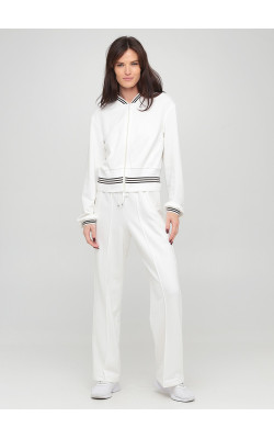 Широкі трикотажні штани білого кольору