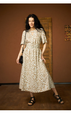 Сукня бежевого кольору в білий принт