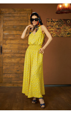 Сукня жовтого кольору в квітковий принт